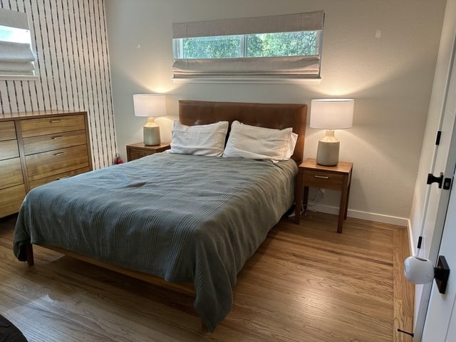 bedside lamps on either side of bed in a bedroom