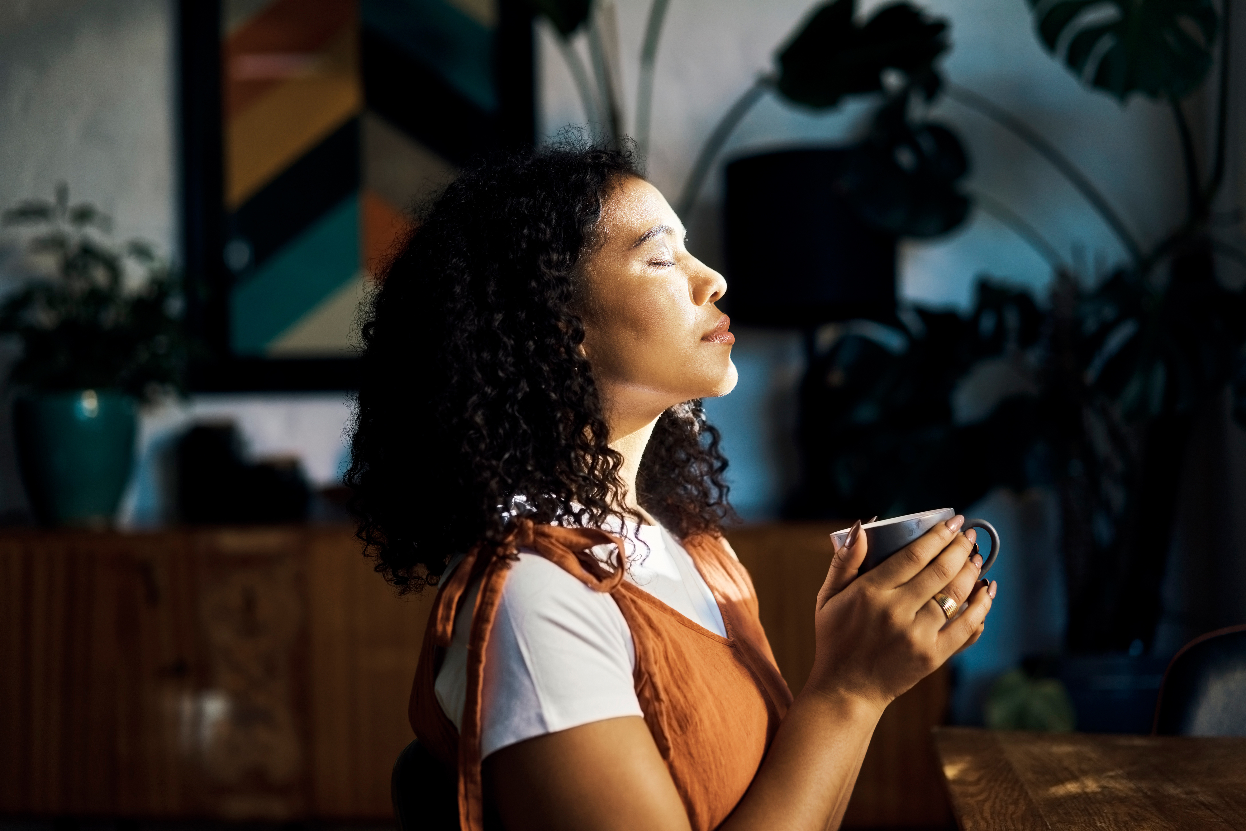 a person with a coffee cup in their hand