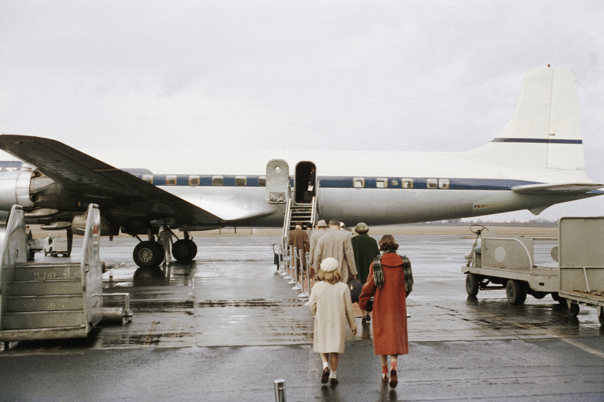 Passengers are boarding an airplane