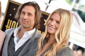 Brad Falchuk and Gwyneth Paltrow, smiling side by side in formal attire