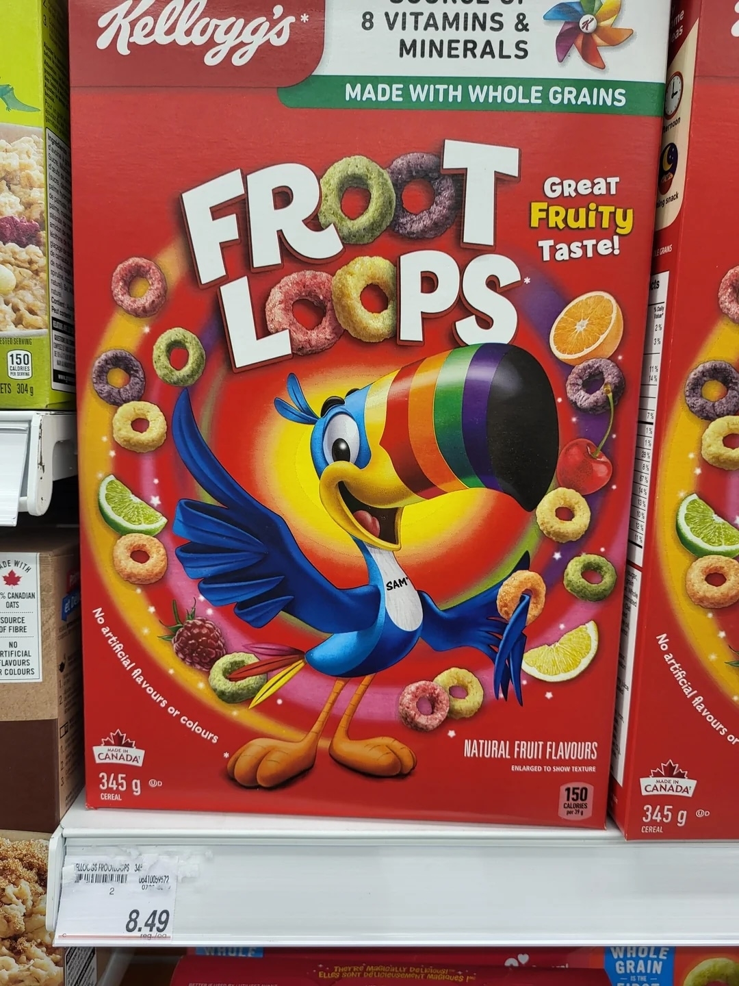 Toucan Sam on Froot Loops box with cereal pieces and fruits around; one box has a price of $8.49.