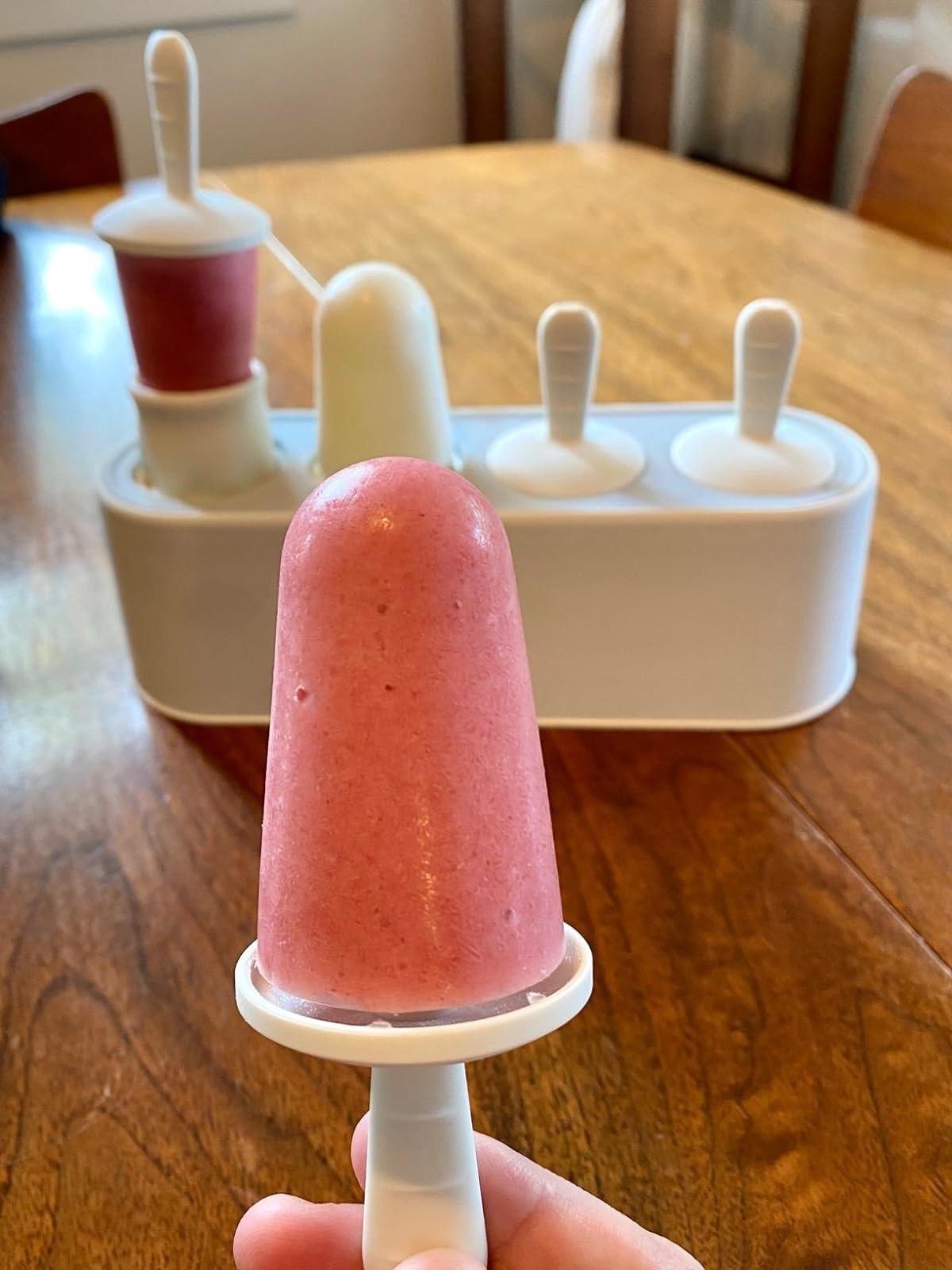 A ice pop in front of the mold