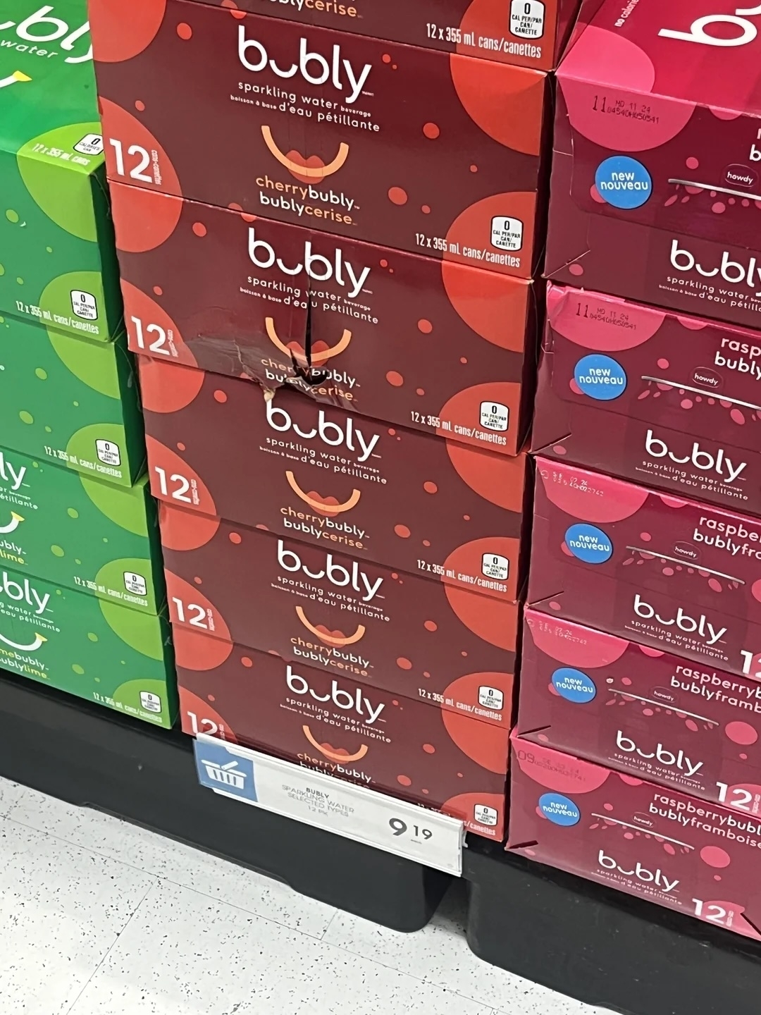Shelves stocked with various flavors of Bubly sparkling water in a store