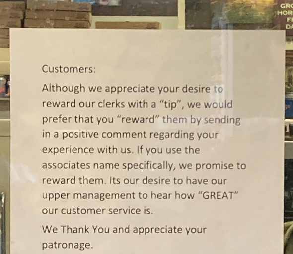Sign in store reads: Customers, we prefer comments on your experience instead of tips to reward clerks. Mention associate names for recognition. Thank you for your patronage