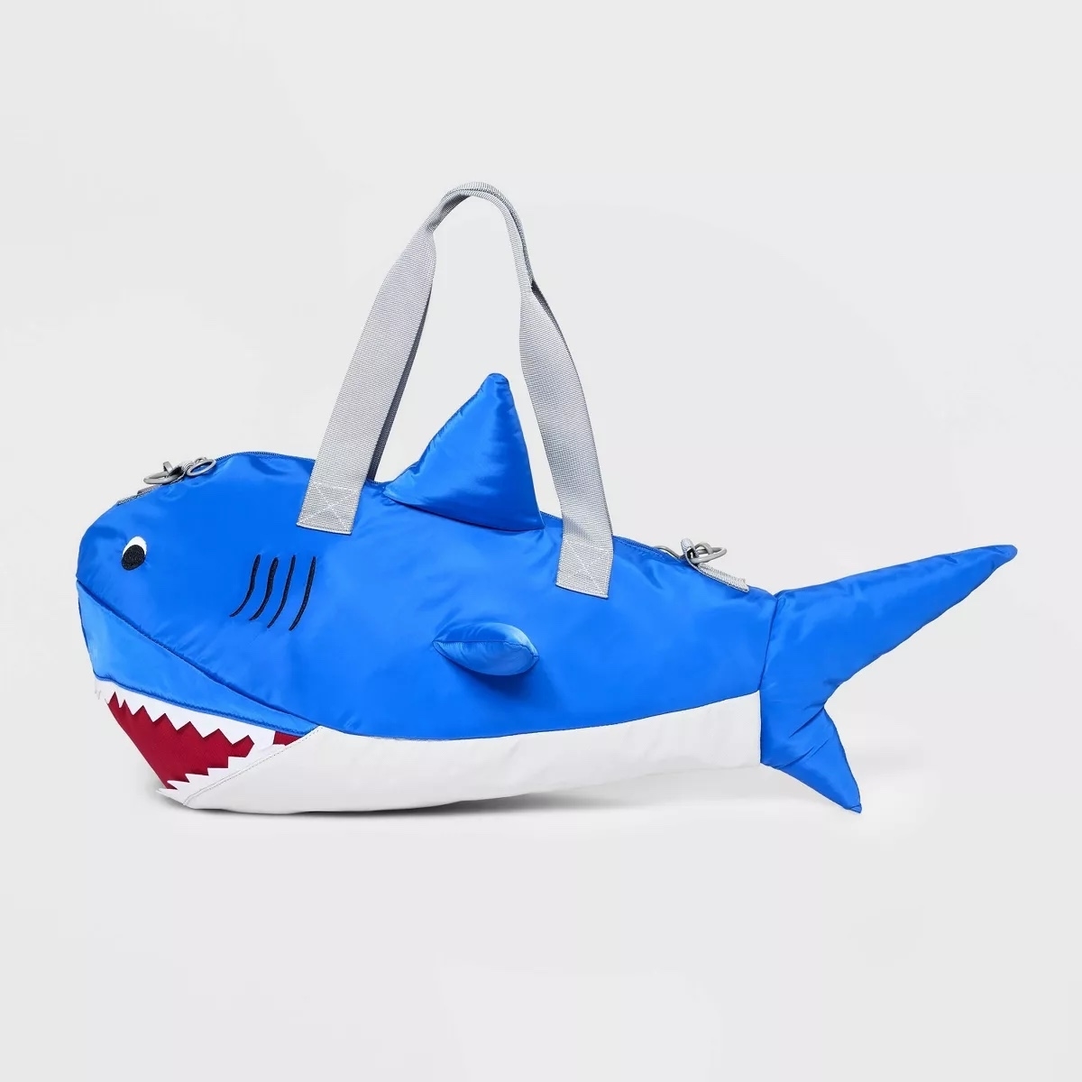 Shark-shaped zippered tote bag with handles, designed to resemble a smiling shark