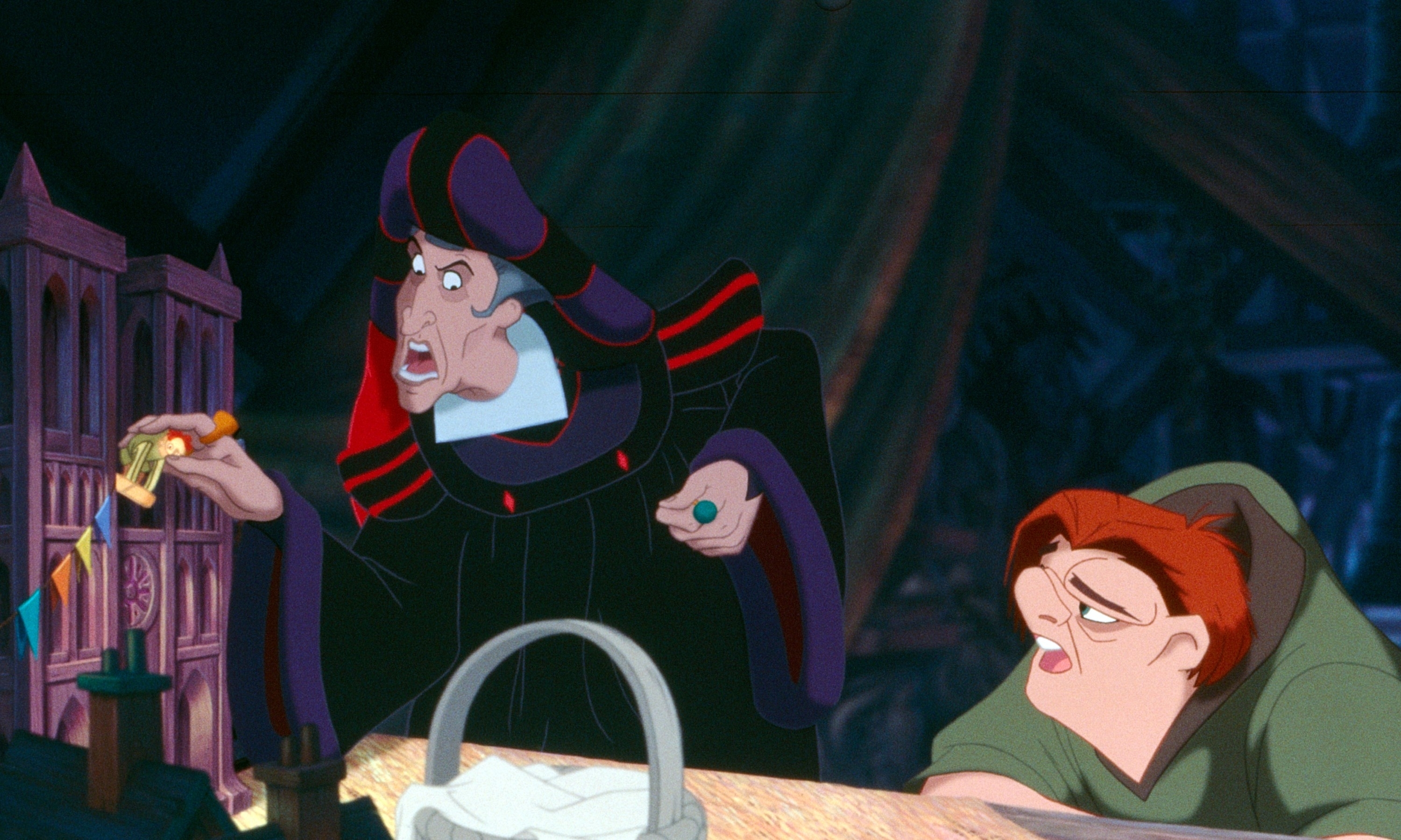 Frollo confronts Quasimodo inside the bell tower in a scene from &quot;The Hunchback of Notre Dame.&quot;