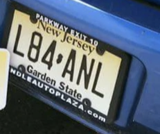New Jersey license plate with the text &quot;L84ANL&quot; on a blue car