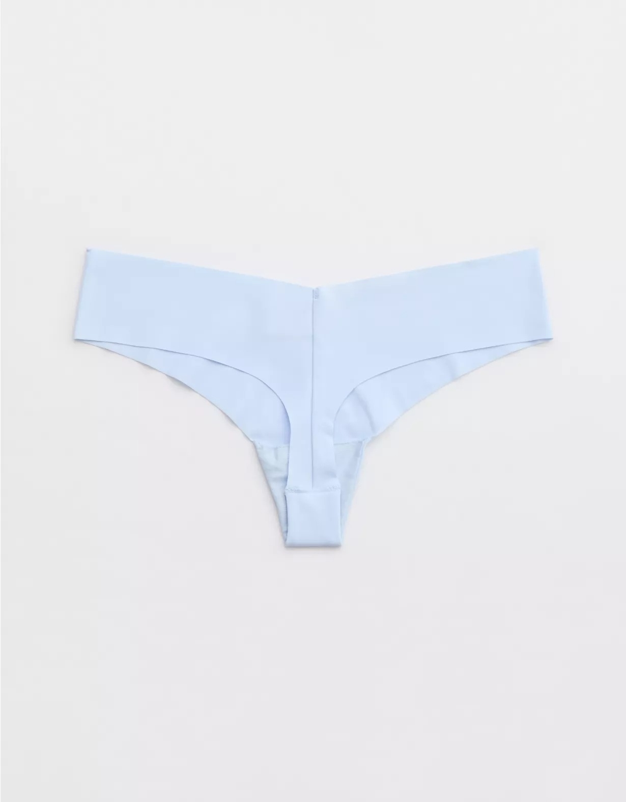 Light blue thong with a seamless design, featuring a wide waistband and minimal stitching for comfort and a smooth fit