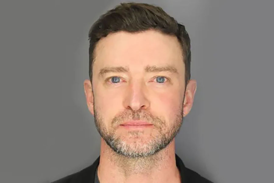 Justin Timberlake in a headshot, staring directly at the camera with a neutral expression