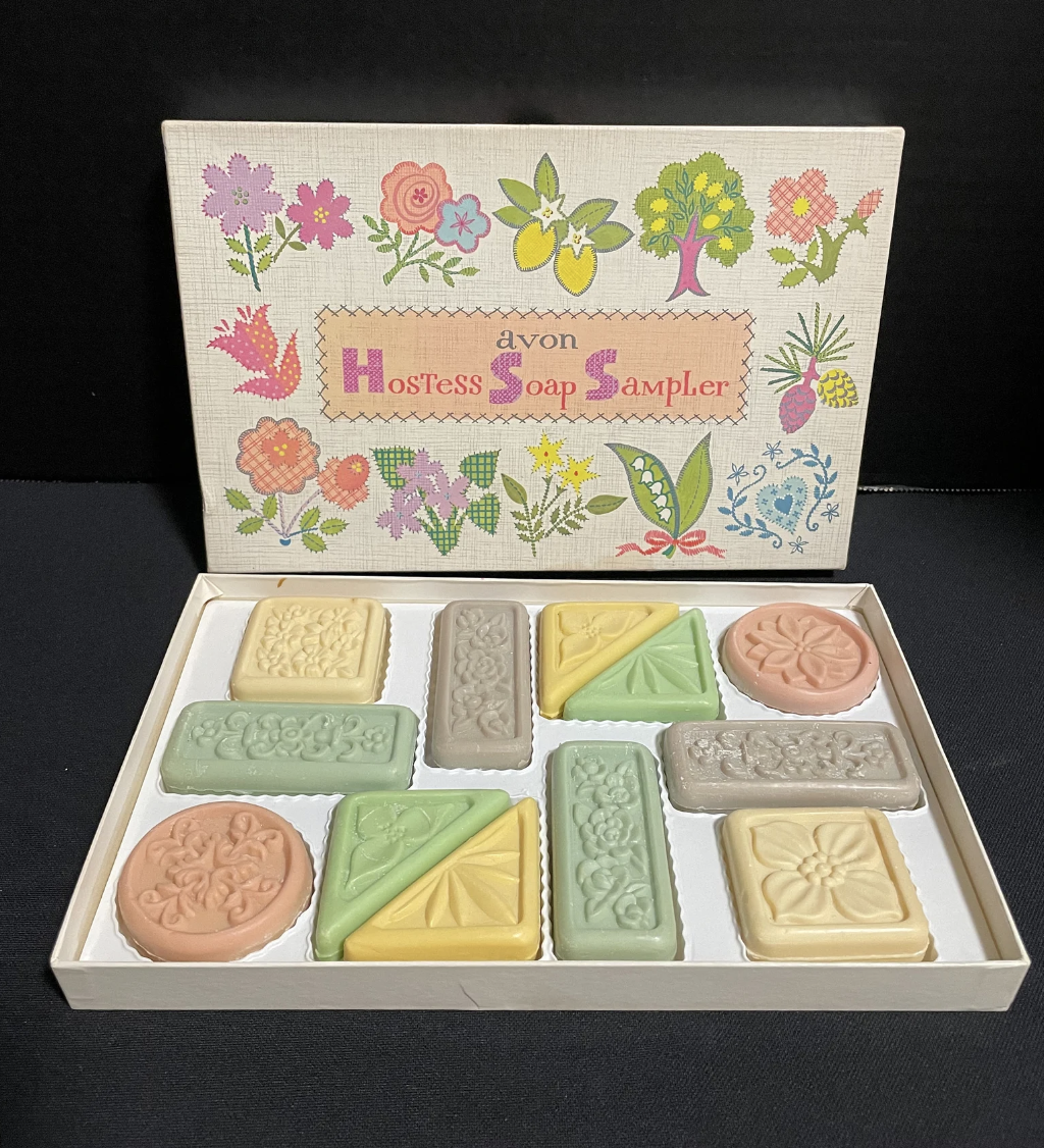 Avon Hostess Soap Sampler box with colorful floral design contains nine ornate soaps of different shapes revealing intricate patterns