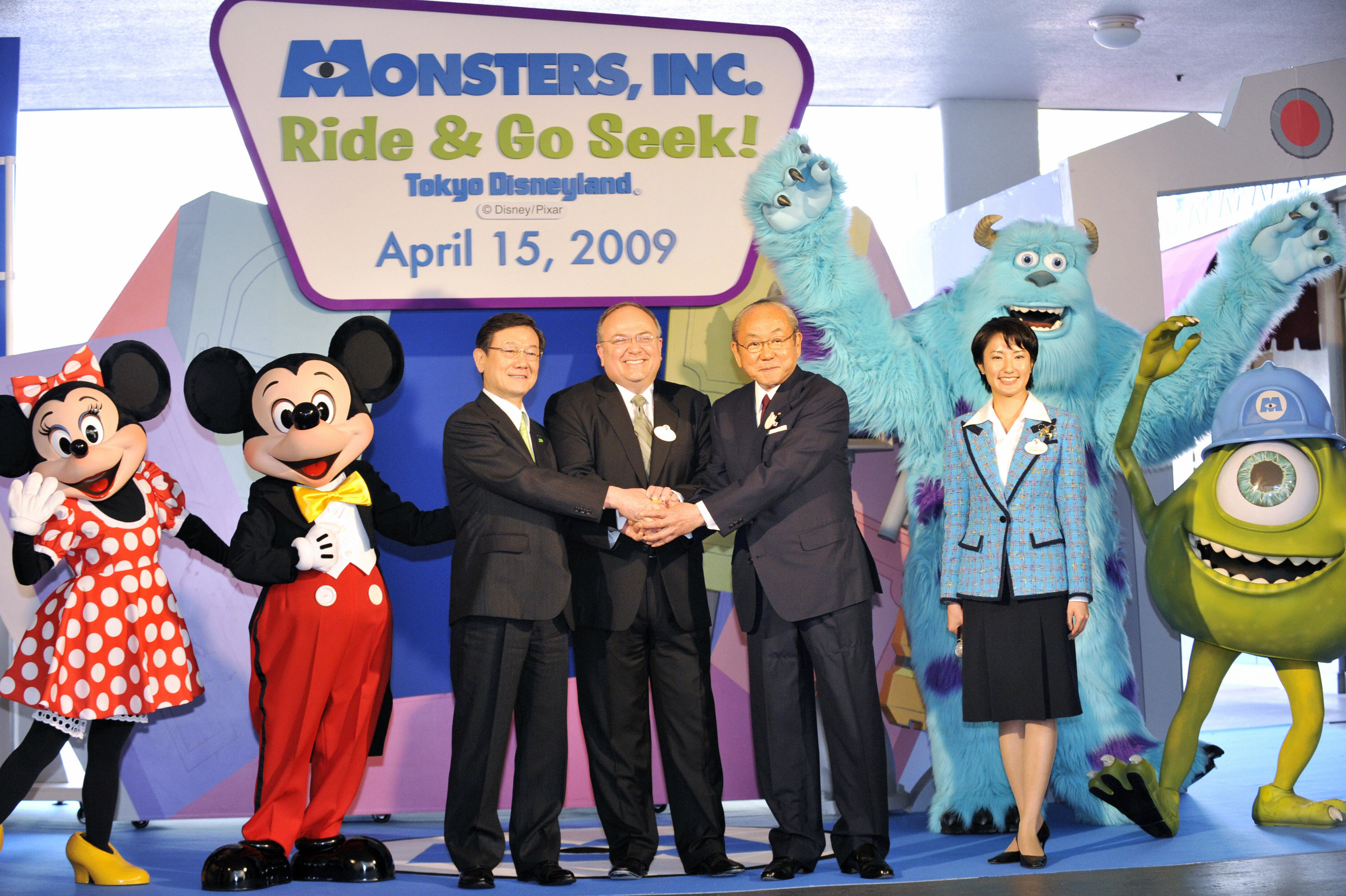 Minnie Mouse, Mickey Mouse, and Monsters, Inc. characters celebrate the launch of &quot;Monsters, Inc. Ride &amp;amp; Go Seek!&quot; at Tokyo Disneyland on April 15, 2009, with park officials
