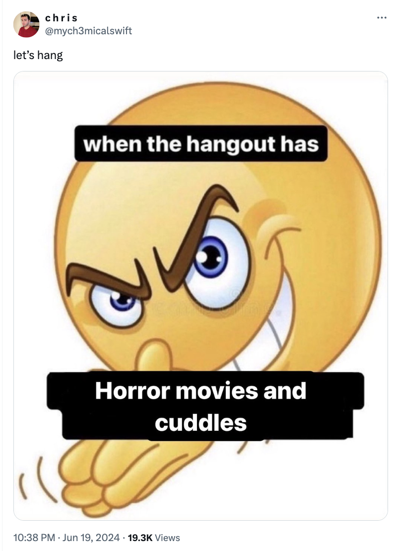 Emoji with mischievous facial expression and text: &quot;when the hangout has Horror movies and cuddles.&quot; Tweet by @mych3micalswift: &quot;let&#x27;s hang.&quot;