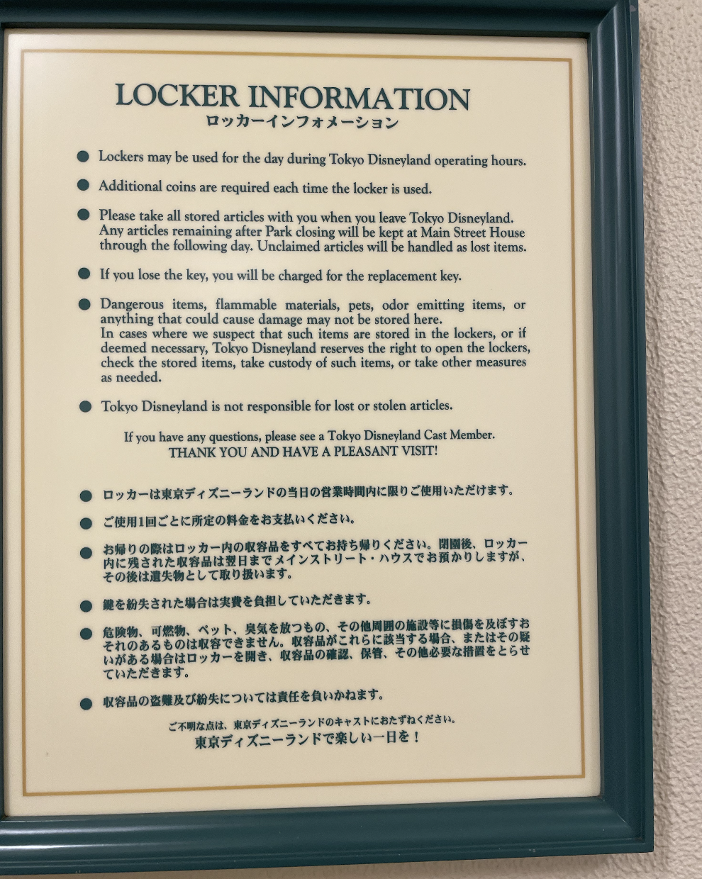 Locker Information sign with rules about locker usage at Tokyo Disneyland. Includes guidelines on storage, fee policy, prohibited items, and liability disclaimer