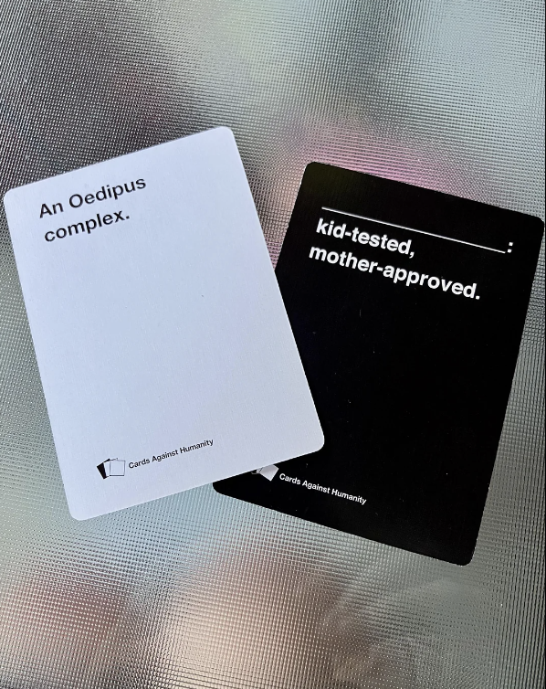 Two Cards Against Humanity cards: one white card reads &quot;An Oedipus complex.&quot; and one black card reads &quot;kid-tested, mother-approved.&quot;