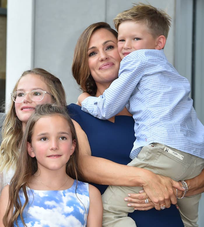 Jennifer Garner poses with her children Violet Affleck, Seraphina Rose Elizabeth Affleck and Samuel Garner Affleck at her star on the Hollywood Walk of Fame