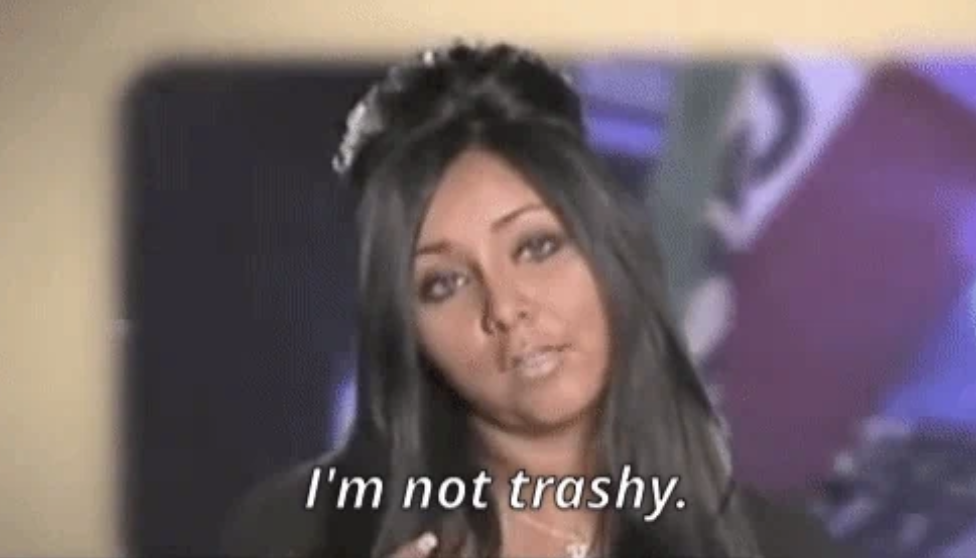 Snooki from Jersey Shore looks at the camera with the caption &quot;I&#x27;m not trashy&quot; displayed at the bottom of the image