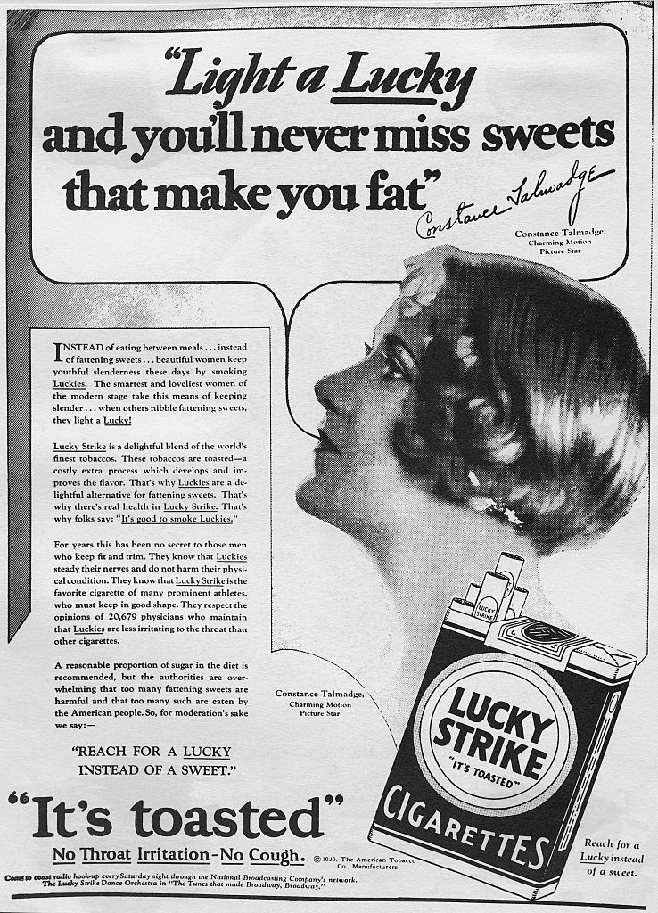 An old Lucky Strike advertisement featuring Constance Talmadge, promoting the brand with the slogan &quot;Light a Lucky, and you&#x27;ll never miss sweets that make you fat.&quot;