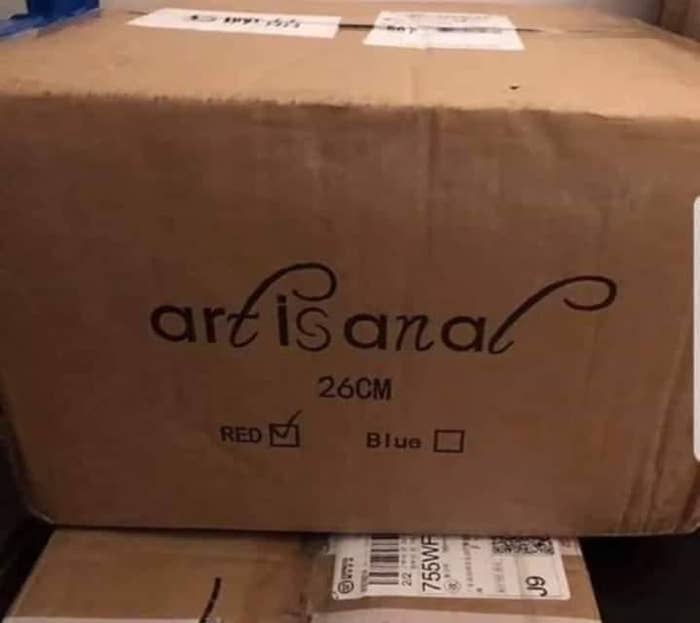 A cardboard box labeled &quot;artisanal,&quot; but the curvy T and L make it appear to read &quot;art is anal&quot;