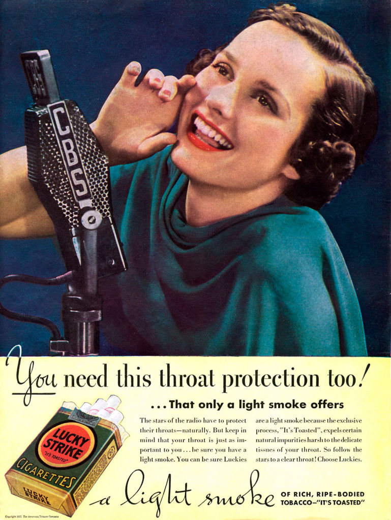 A vintage advertisement featuring a smiling woman posing with a microphone and a Lucky Strike cigarette pack, promoting the slogan, &quot;a light smoke.&quot;