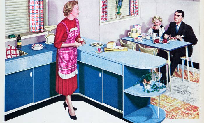 Advertisement for Formica featuring a woman in a kitchen with a man and child sitting at a table. Text highlights the benefits of Formica surfaces