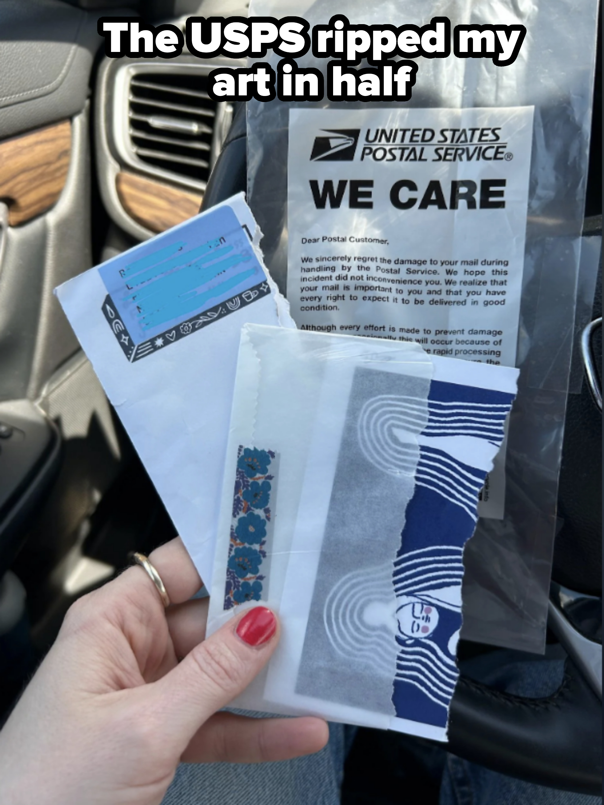 A hand holds a damaged USPS envelope with a note explaining the damage and two smaller envelopes