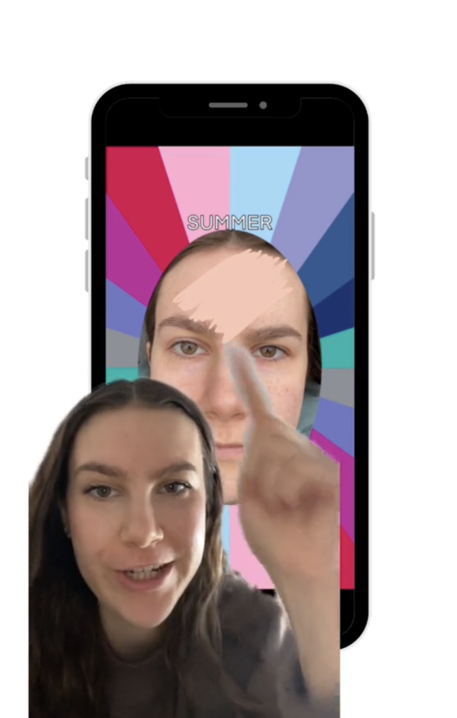 A person points to a smartphone displaying a face labeled &quot;Summer&quot; on the screen. Various colors radiate behind the face on the phone display