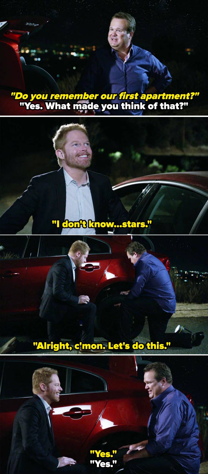 Eric Stonestreet and Jesse Tyler Ferguson, wearing dark suits, change a car tire at night in a scene from a TV show