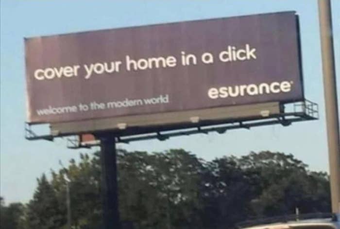 An esurance billboard that appears to read, &quot;cover your home in a dick&quot; instead of &quot;cover your home in a click&quot;
