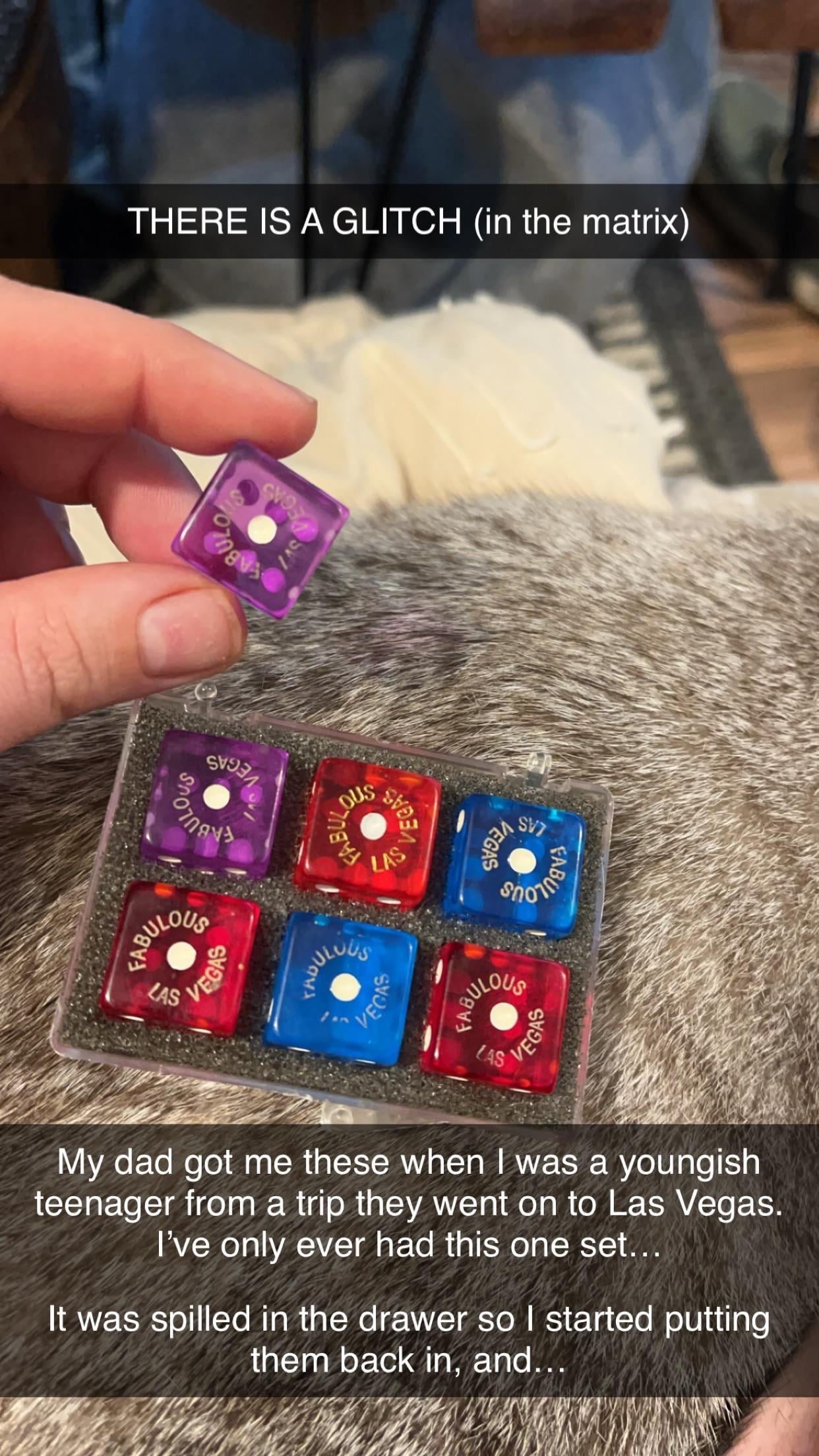 Showing a complete set of six dice with a mysterious seventh dice that does not belong
