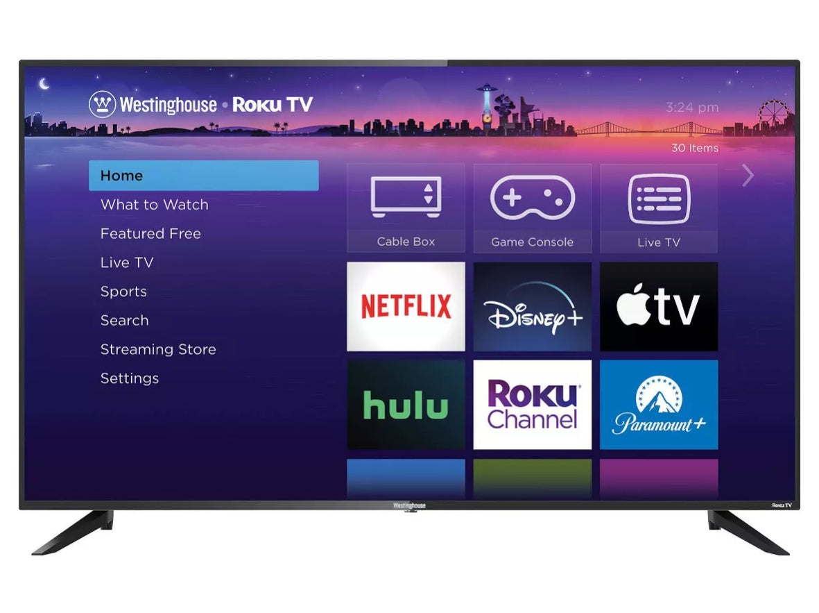 TV screen displaying a menu with various streaming options including Netflix, Disney+, Hulu, Apple TV, and more. Top left shows Westinghouse Roku TV branding