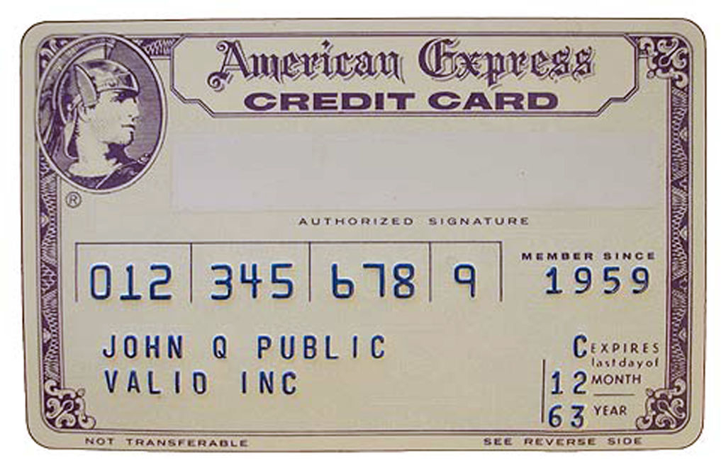 A vintage American Express credit card with the name John Q Public, issued by Valio Inc, showing an expiration date of 12/63