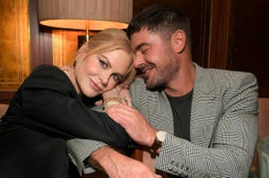 Zac Efron and Nicole Kidman are featured in two images: one on a red carpet event with Zac in a tuxedo and Nicole in an elegant dress, and another in a cozy setting