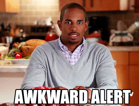 Damon Wayans Jr. making a surprised and awkward face, sitting at a kitchen table, with &quot;AWKWARD ALERT&quot; in large text at the bottom of the image