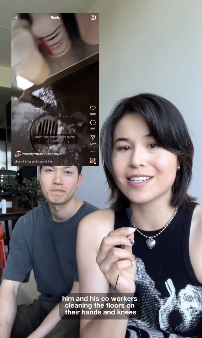 Man and woman smile at the camera while seated indoors. Text on video behind them reads: &quot;which tile he scrubs every seven days.&quot;