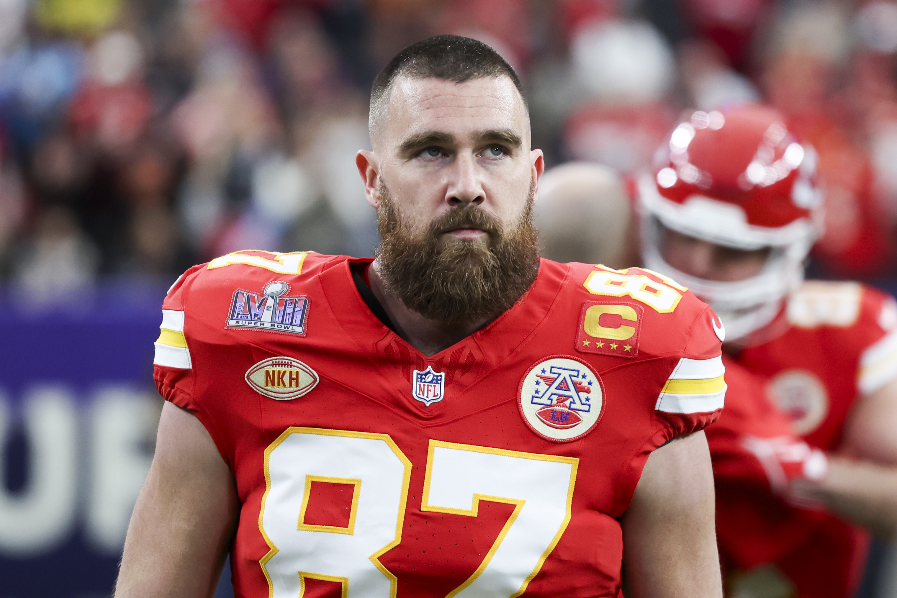 Travis Kelce in a football uniform with the number 87 during a game for the Kansas City Chiefs