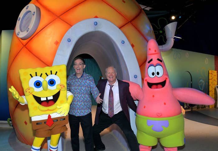 Tom Kenny and Bill Fagerbakke pose with SpongeBob SquarePants and Patrick Star characters at a themed event