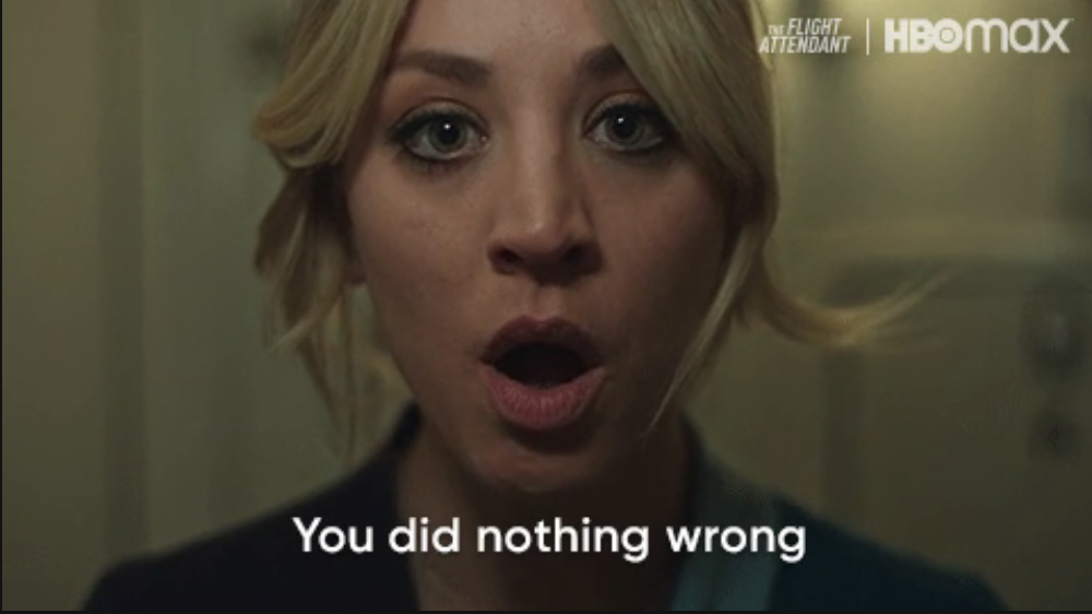 Kaley Cuoco&#x27;s character with a surprised expression, text overlaid: &quot;You did nothing wrong,&quot; from the HBO Max series &quot;The Flight Attendant.&quot;