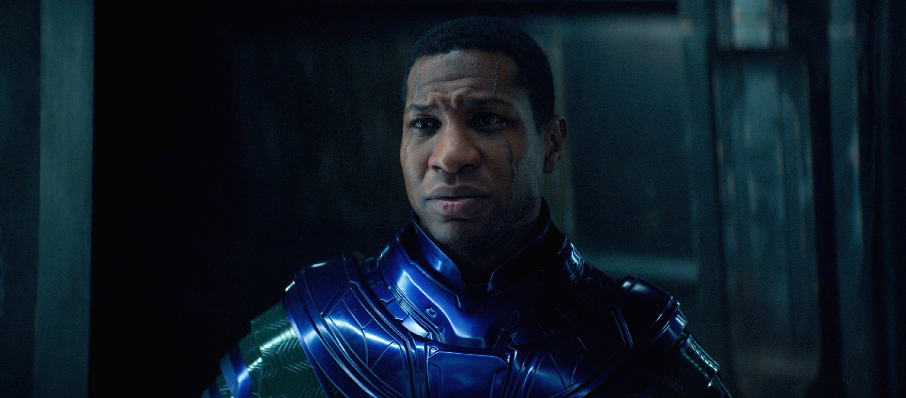 Jonathan Majors, as Kang the Conqueror, wearing futuristic, metallic armor from a scene in a film