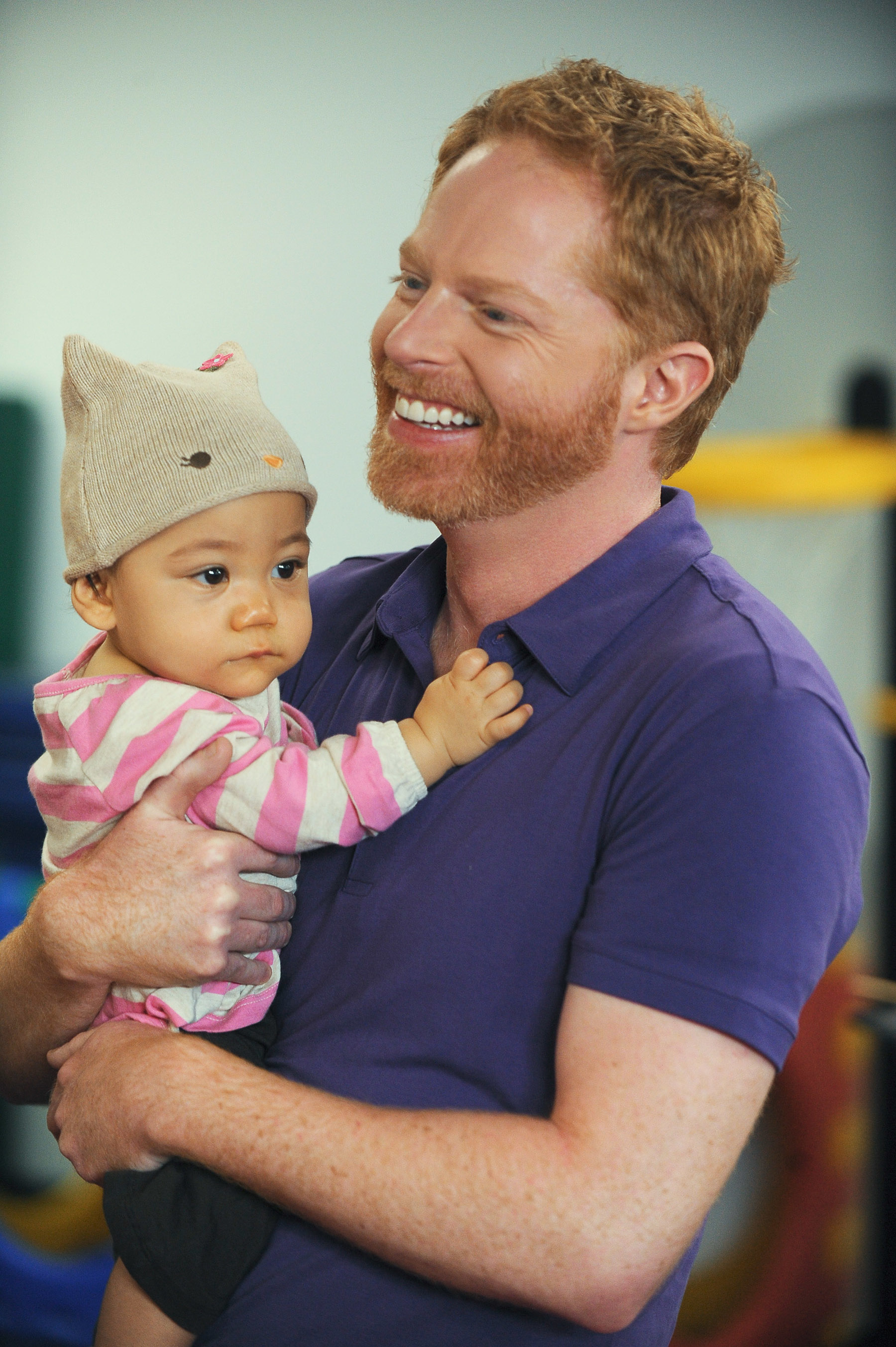 Mitchell holding baby Lily