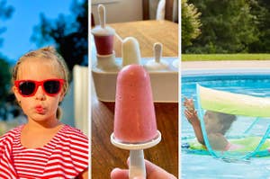 A fruit-flavored popsicle next to its mold on a table and a striped lounge chair cabana by a swimming pool with palm trees in the background
