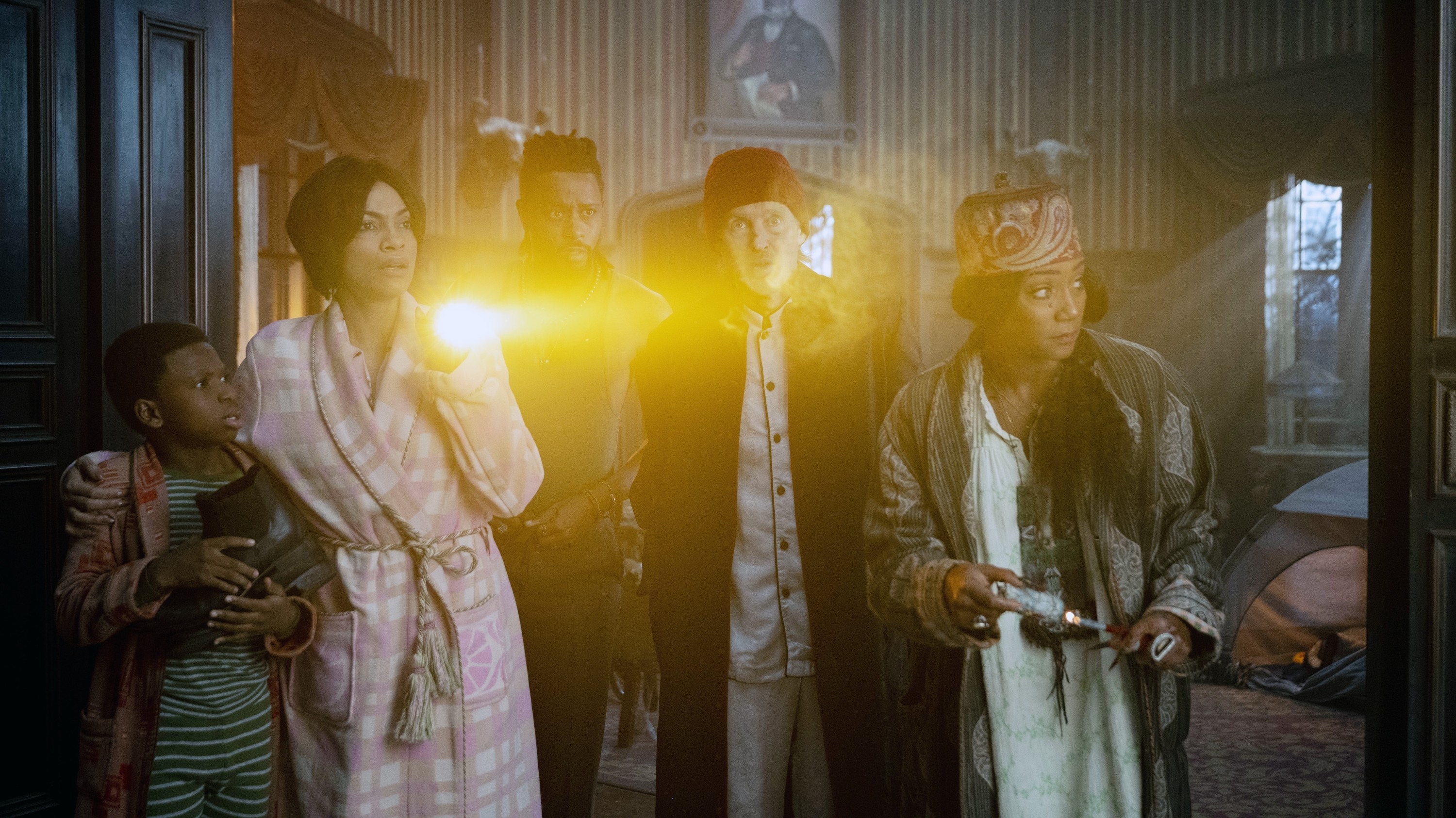 Chase Dillon, Rosario Dawson, LaKeith Stanfield, Owen Wilson, and Tiffany Haddish in &quot;Haunted Mansion&quot;