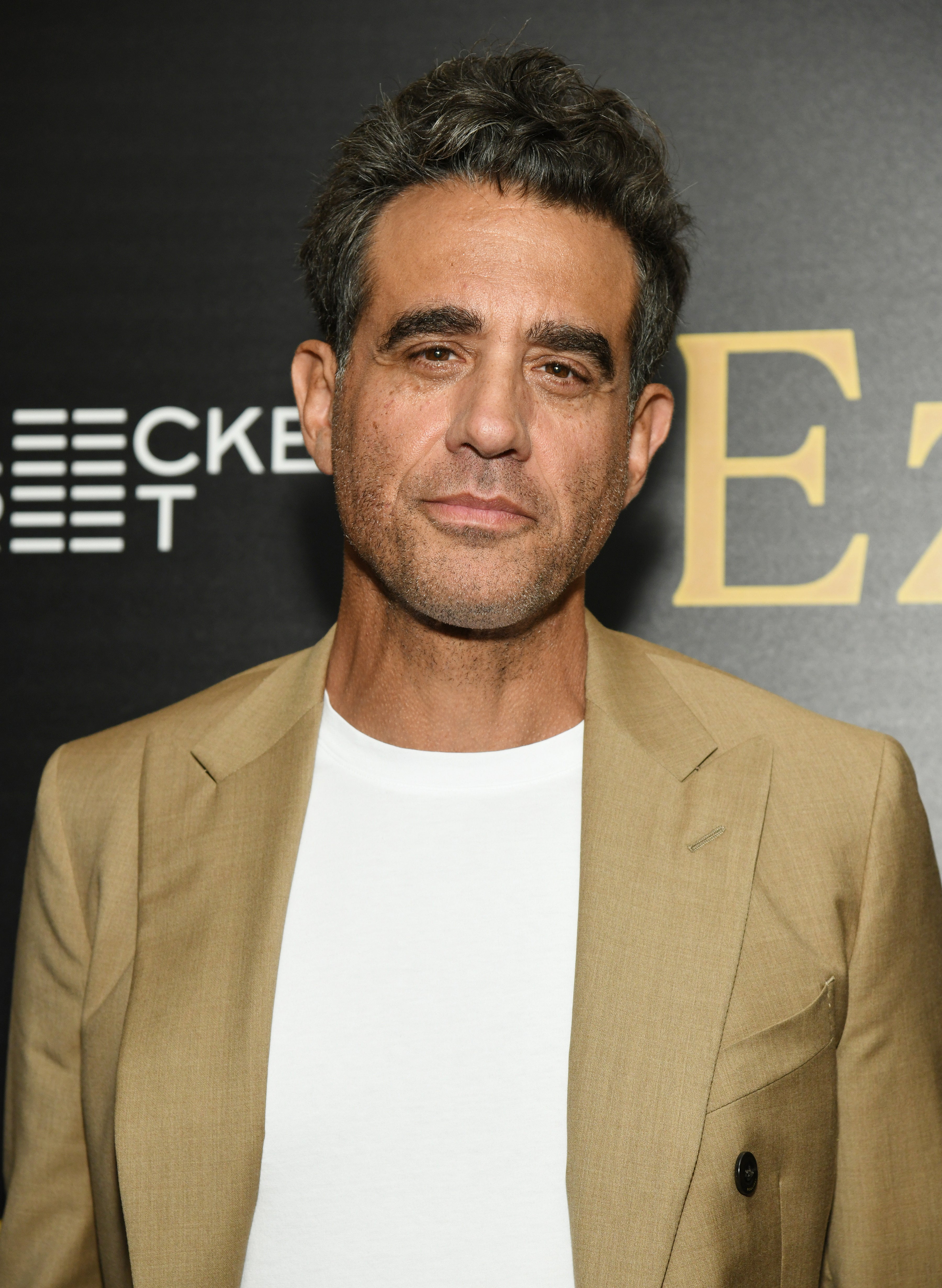 Bobby Cannavale wears a white shirt under a tan blazer at the premiere of &quot;Ezra&quot;