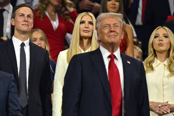 Jared Kushner, Ivanka Trump, Donald Trump, and Tiffany Trump stand together at an event