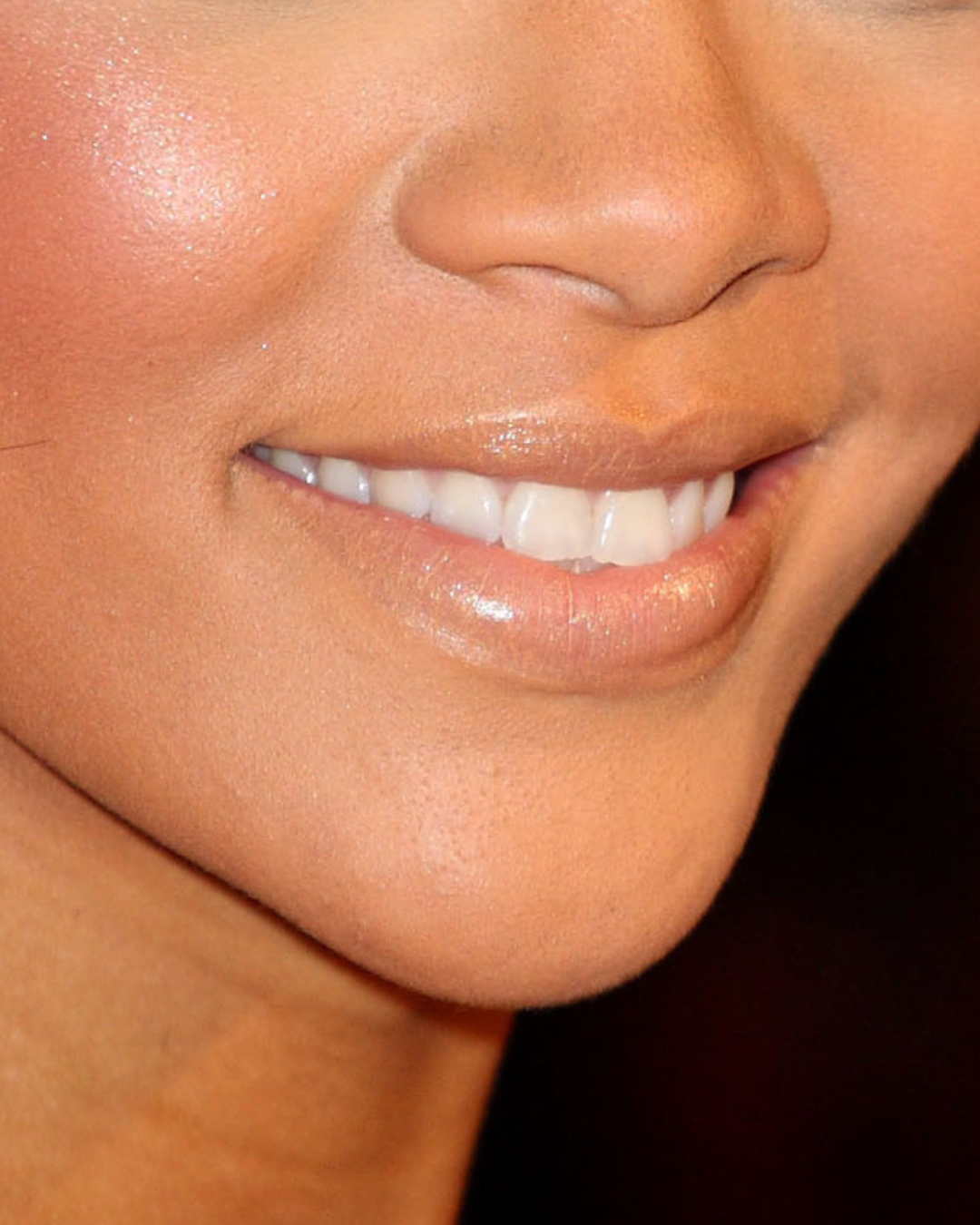 A close-up of Rihanna&#x27;s pale concealer coated lips