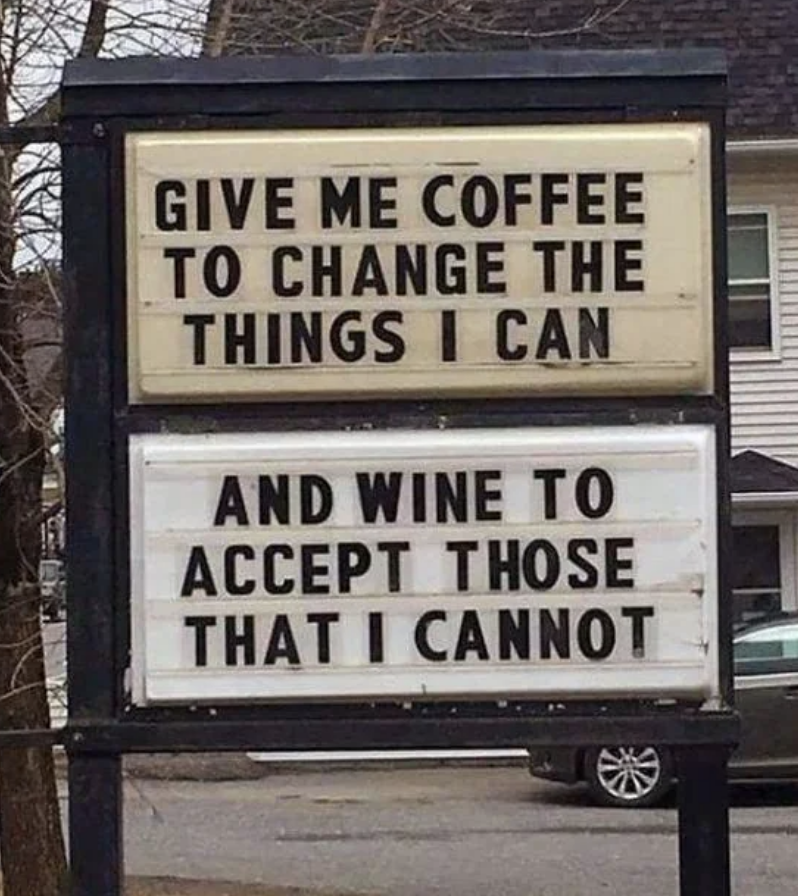 A signs that reads, &quot;give me coffee to change the things I can and wine to accept those that I cannot&quot;