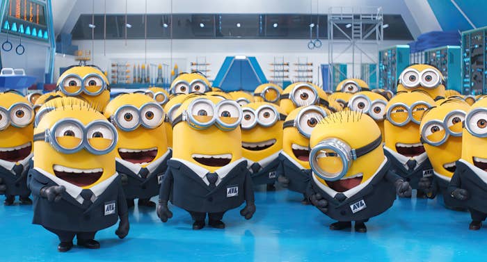 Several Minions wearing suits, ties, and googles