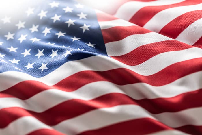 A close-up of the United States flag with stars and stripes