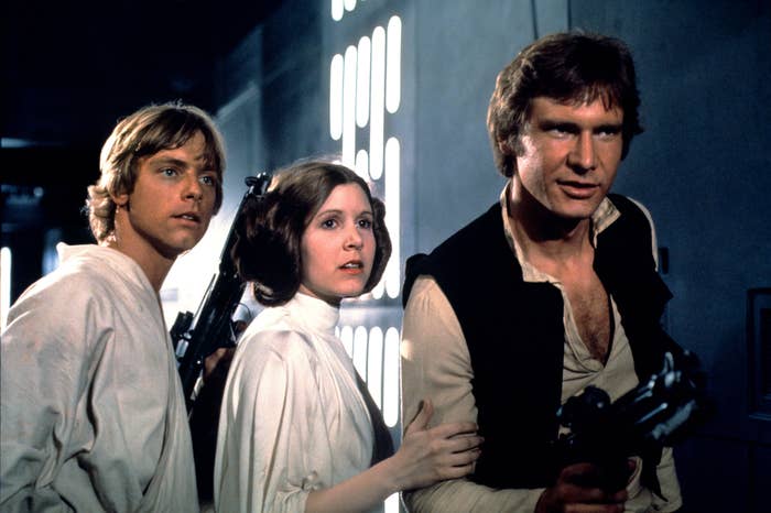 Mark Hamill as Luke Skywalker, Carrie Fisher as Princess Leia, and Harrison Ford as Han Solo in a scene from &quot;Star Wars&quot;