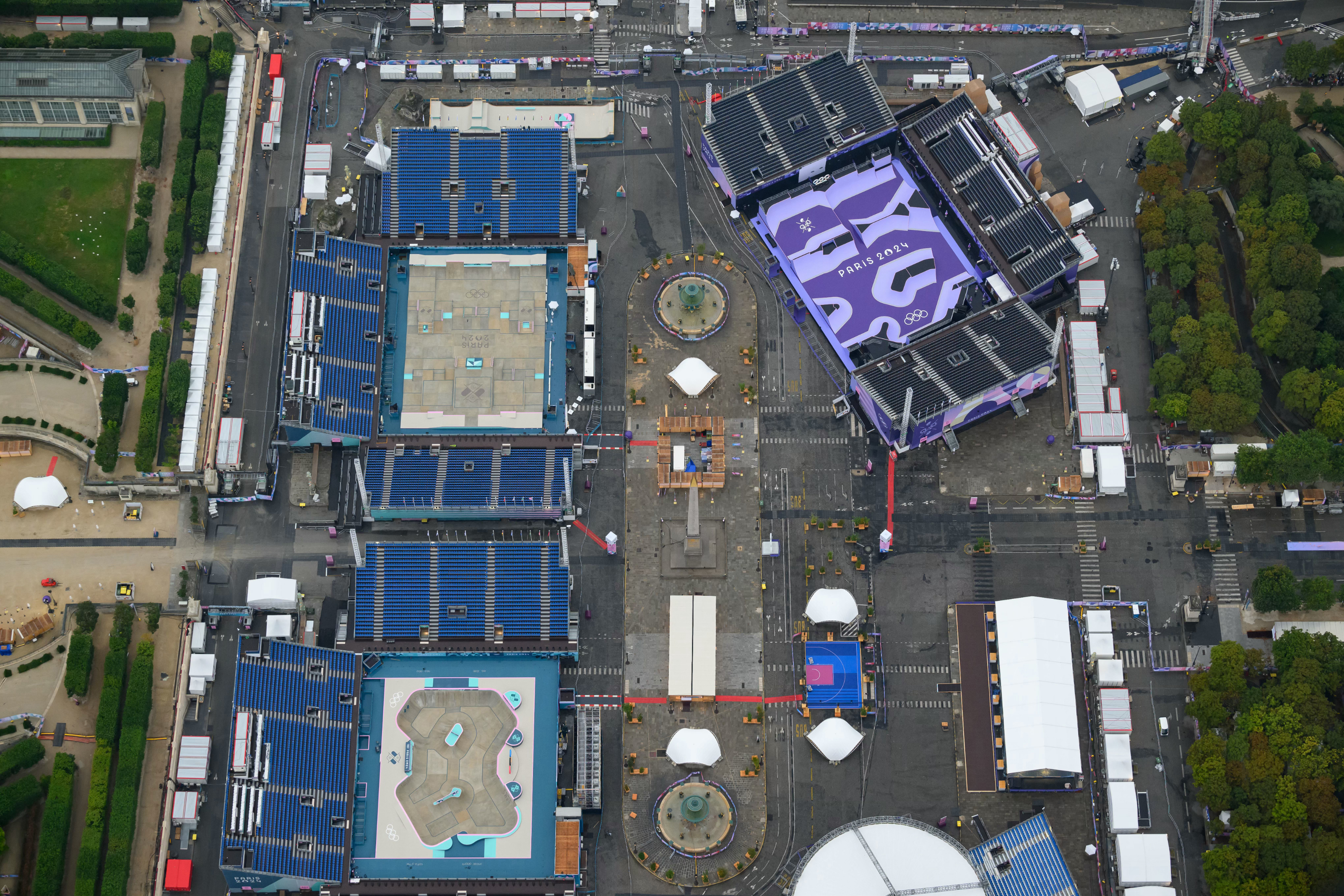 Aerial view of a sports event venue with multiple arenas, seating areas, and activity spaces, likely prepared for competitions