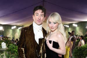 Barry Keoghan in a velvet suit with a top hat and Sabrina Carpenter in a strapless gown with a dramatic train at the Met Gala